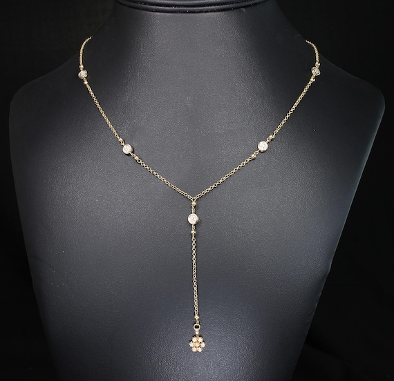 Vintage lariat style necklace, 14K yellow gold and diamonds