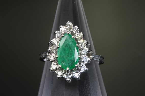 Vintage 1980s pear shaped emerald with diamond halo 14K white gold ring