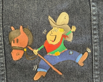 Hand painted denim jacket “A boy and his stick horse”