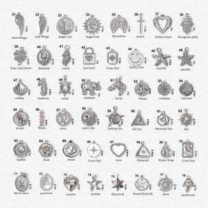May include: A collection of forty-eight silver-toned metal charms arranged in a grid, each labelled with a number from 31 to 78 and its corresponding height in cm. The charms feature various shapes including animals, celestial symbols, and hearts.