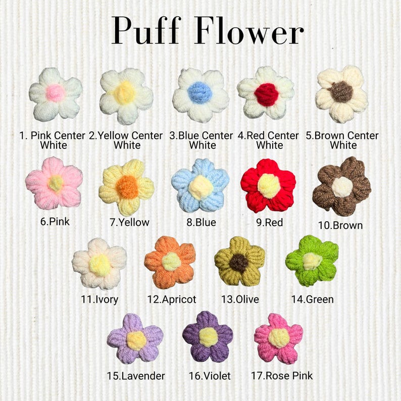 May include: A collection of seventeen crochet puff flowers arranged in a grid, labeled 1 through 17 with text identifying colors. Each flower features five rounded petals and a contrasting center, showcasing a variety of colors including white, pink, yellow, blue, red, brown, ivory, apricot, olive, green, lavender, violet, and rose pink.