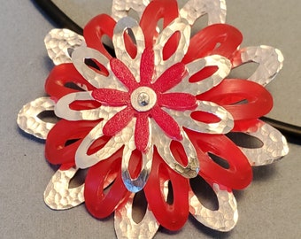 Sterling Silver Nine Petaled Flower Pendant with Cutouts and Red Center