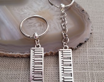 Llavero con teclas de piano, llavero con teclado para mochila o bolso, tirador de cremallera