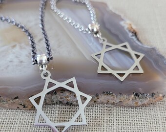 Heptagramketting: bronskleurige of zilveren roloketting