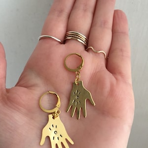 Sunburst hand brass earrings