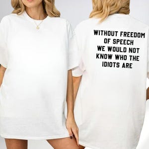 A white t-shirt with text on the back.