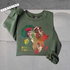 a green shirt with a picture of a man and a woman on it