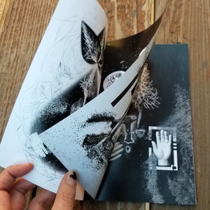 May include: A black and white photo collage with a hand reaching out from a frame. The collage is made up of different images, including a tree, a face, and a hand.
