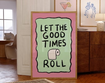 Może przedstawiać: Różowo-zielony plakat w ramie z tekstem "Let the good times roll" i kreskówkowym obrazkiem rolki papieru toaletowego.