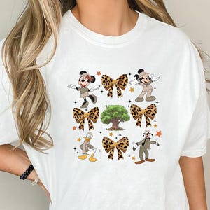 Comfort Colors Mickey And Friends Leopard Coquette Bows Animal Kingdom Shirt, Disney Safari Mode Let&#39;s Get Wild Tee, Magic Kingdom Family