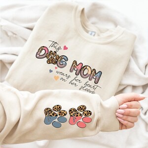 Personalized Dog Mom Sweatshirt, This Dog Mom Wears Her Heart On Her Sleeve, Custom Dog Name Sweatshirt,Dog Mama Sweater,Dog Lover Gift