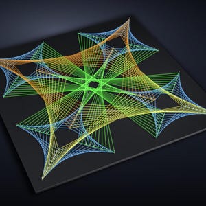 May include: A square black board featuring a geometric string art design. The pattern is created with vibrant green, orange, and blue threads stretched between small pins, forming a complex, symmetrical star-like shape with curved edges.