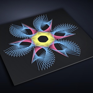 May include: A string art piece on a black square board featuring a geometric floral pattern created with light blue, pink, and yellow threads wrapped around silver nails. The design forms a central yellow hexagon with six symmetrical petals.