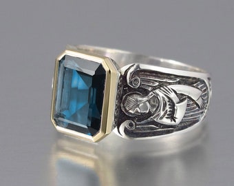 GUARDIAN ANGELS silver and 14K ring with emerald cut London Blue Topaz