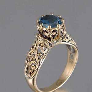 The ENCHANTED PRINCESS engagement 14k yellow gold ring with London Blue Topaz