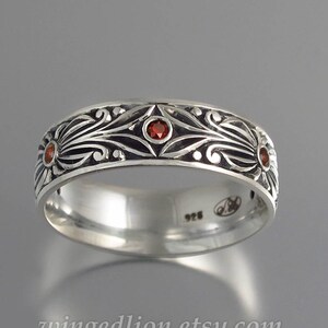 The COUNT silver wedding band with garnet mens unisex ring