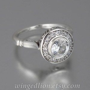 The SECRET DELIGHT 14k gold 1ct White Sapphire engagement ring with white sapphire halo 14k white gold