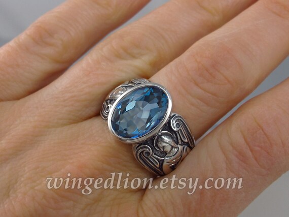 Sterling Silver Blue Topaz Gemstone on Concave Ring Size 8 Sterling Silver Blue Topaz Gemstone on Concave Ring Size 8