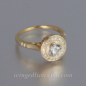 The SECRET DELIGHT 14k gold 1ct White Sapphire engagement ring with white sapphire halo 14k yellow gold