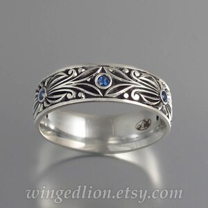 The COUNT silver and Blue Sapphires wedding band