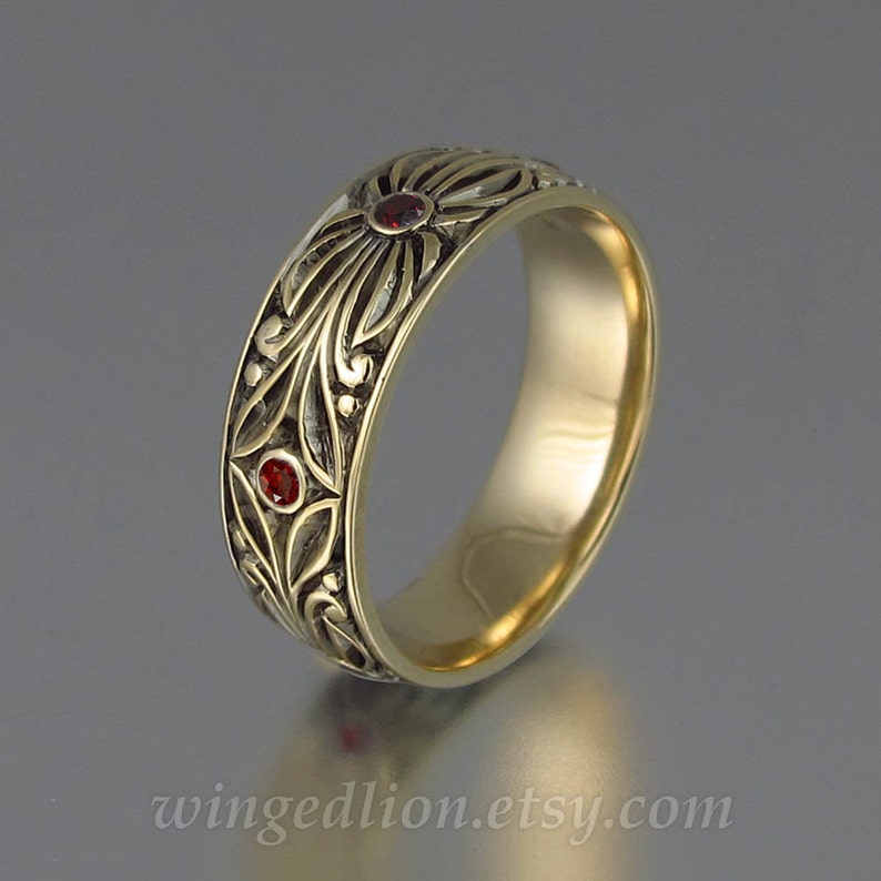 The COUNT mens wedding band in 14K yellow gold with Garnets 14k yellow gold