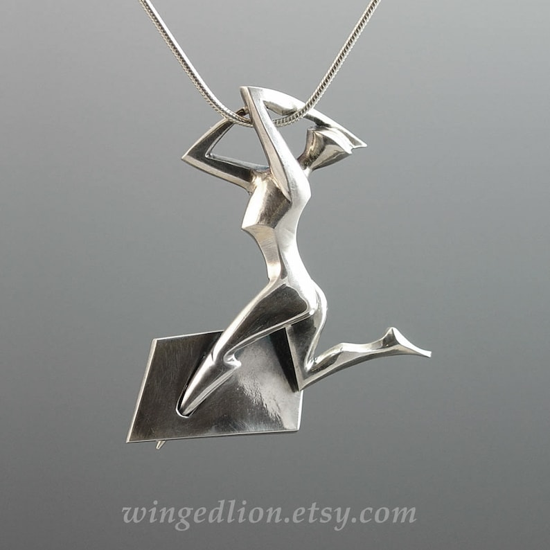 ON THE RUN silver pendant image 1