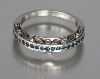 The ENCHANTED sterling silver wedding band with London Blue Topazes half-eternity band