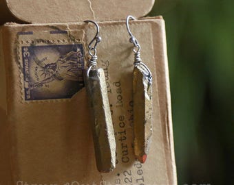 Strung-Out guitar string earrings with gold quartz points