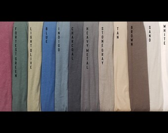 May include: A row of 12 fabric swatches in various colours, including heather maroon, forest green, light olive, blue, indigo, charcoal, heavy metal, stone grey, tan, brown, sand, and white.