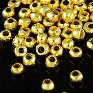 KG-101 Thai Karen hill tribes Silber 50 er Gold Vermeil Mini Facettenperle