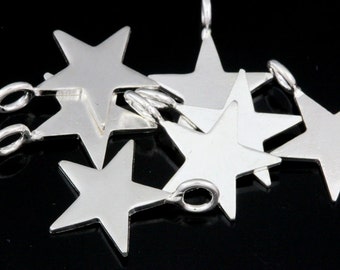 3KH-125 thai karen hill tribe handmade silver 8 small die cut star shape charm 12.0 mm.