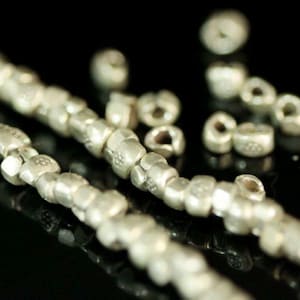 KI-002 Thai karen hill tribe silver 30 flower printed mini spacer bead