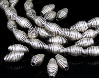 KH-002 thai karen hill ribe silver 20 small swirl bicone bead