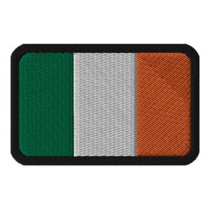 May include: A rectangular embroidered patch with the Irish flag. The flag is green, white, and orange.