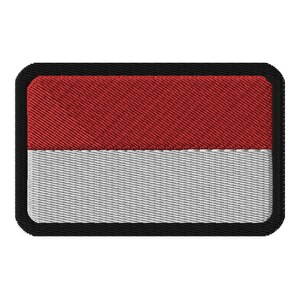 May include: A red and white embroidered patch with a black border. The patch is rectangular and has a woven texture.