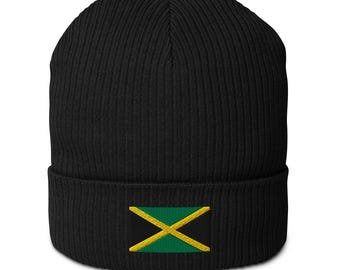 May include: Black knit beanie with a small embroidered Jamaican flag on the front.