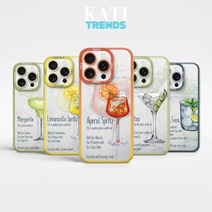 May include: Five different phone cases with a marble background and a cocktail recipe on each. The cocktails are Margarita, Limoncello Spritz, Aperol Spritz, Martini, and Tonic.