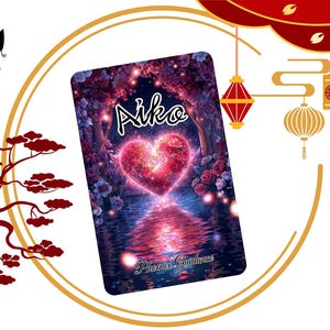 Op de afbeelding: Een rechthoekige kaart met een gloeiend roze hart omringd door donkere bomen en bloemen, met de tekst Aiko en Phoenix Guidance. De kaart is omringd door illustraties van anime-ogen, een rode boom, lantaarns en Japanse karakters.