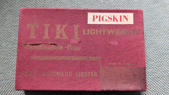 tiki cigarette case Vintage 1950's Tiki Deluxe Combination Pigskin Cigarette Case & Lighter tiki cigarette case Vintage 1950's Tiki Deluxe Combination Pigskin Cigarette Case & Lighter