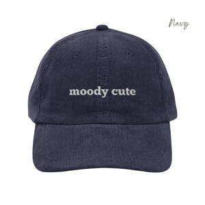 Navy Corduroy Dad Cap with moody cute embroidered in light grey lettering. Unisex style adjustable sizing.