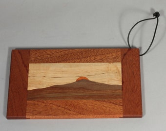 2  (two) miniature mountain cutting boards