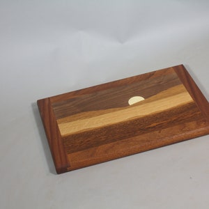 mountain sunrise cutting or serving board