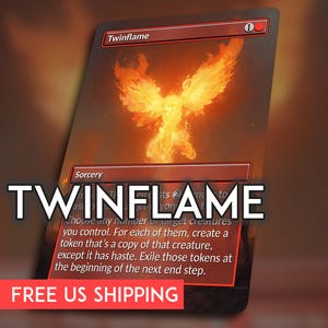 May include: A Magic: The Gathering card titled "Twinflame" with a fiery phoenix illustration. The card has a red border and the text "Sorcery" is visible. The card's title is displayed in large white letters.
