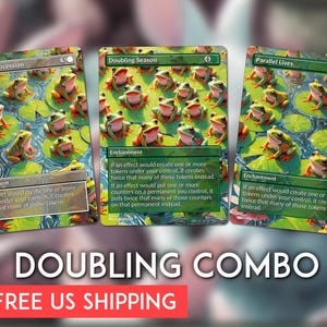 May include: Three Magic: The Gathering cards featuring frog illustrations on lily pads. The cards are titled "Anointed Procession", "Doubling Season", and "Parallel Lives". The text "DOUBLING COMBO" is displayed below the cards.