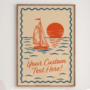 May include: A framed print featuring a sailboat on the ocean with a setting sun. The artwork is in shades of orange, blue, and beige, with the text "Your Custom Text Here!" in a decorative font. The print is displayed on a white wall.