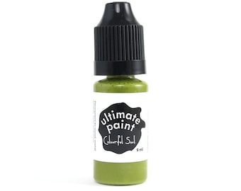 May include: A small bottle of green paint with a black cap. The label says "ultimate paint" and "Colorful Soul" with a black splotch in the background. The bottle contains 9 ml of paint.
