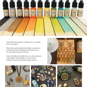 May include: A set of 12 small bottles of colorful wood stain with the brand name "Ultimate Stain" and the text "Colorful Soul". The bottles are arranged in a row on a wooden surface with a background of colorful wood stain samples.