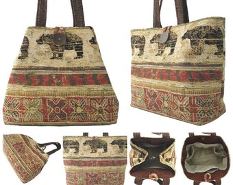 May include: A brown and beige tote bag with a tapestry design featuring black bears and geometric patterns. The bag has brown leather handles and a brown button closure. The bag is shown in multiple views, including the interior lining.