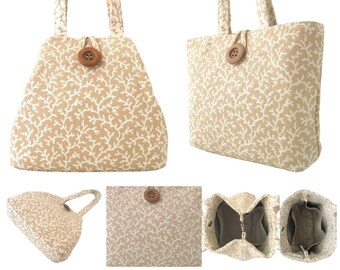 May include: A beige tote bag with a white coral pattern and a wooden button closure. The bag has two top handles and a spacious interior. The bag is shown from multiple angles, including the inside.