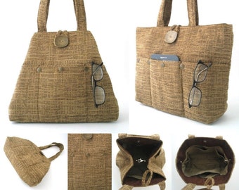 May include: A brown tote bag with multiple pockets and a button closure. The bag has a brown and white striped pattern and is made of a woven fabric. The bag is shown from multiple angles, including the interior.